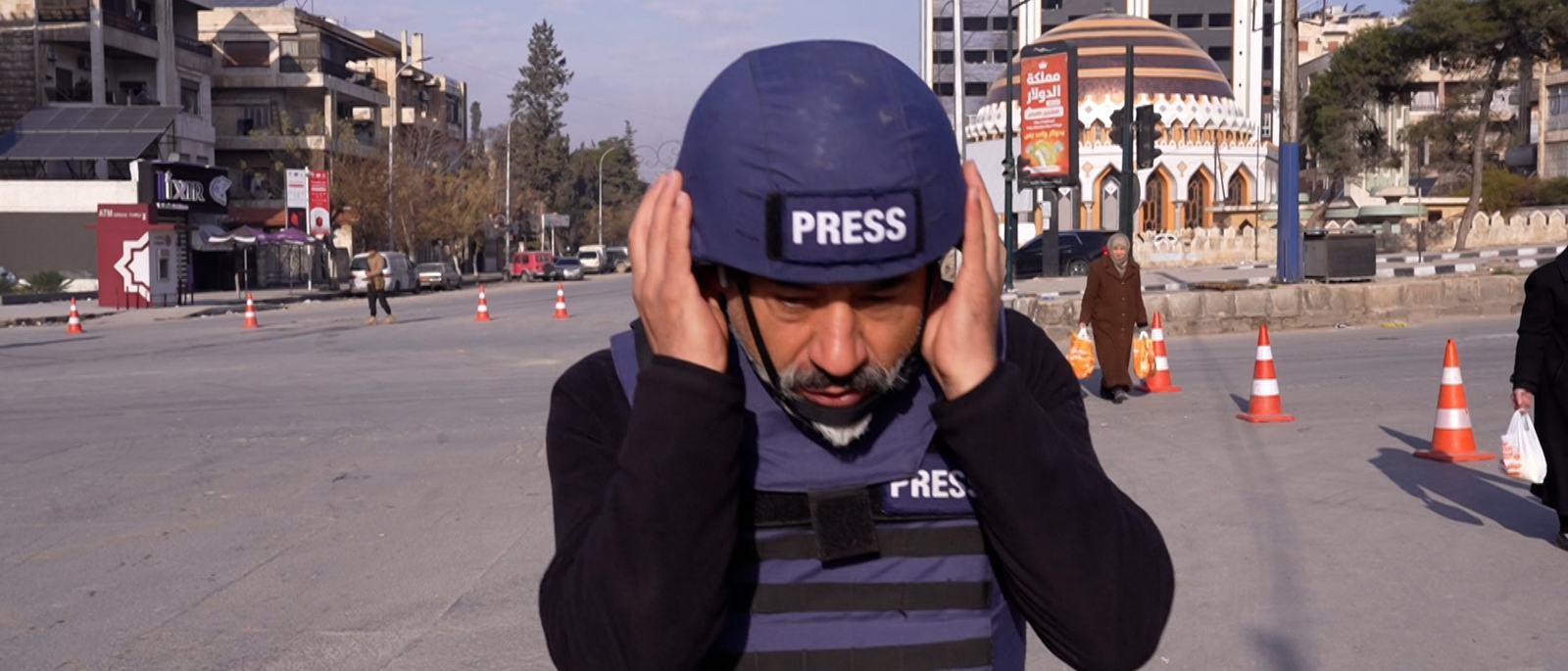 al-jazeera-reporter-takes-cover-as-shots-ring-out-in-aleppo-scrape-1767889998.jpg