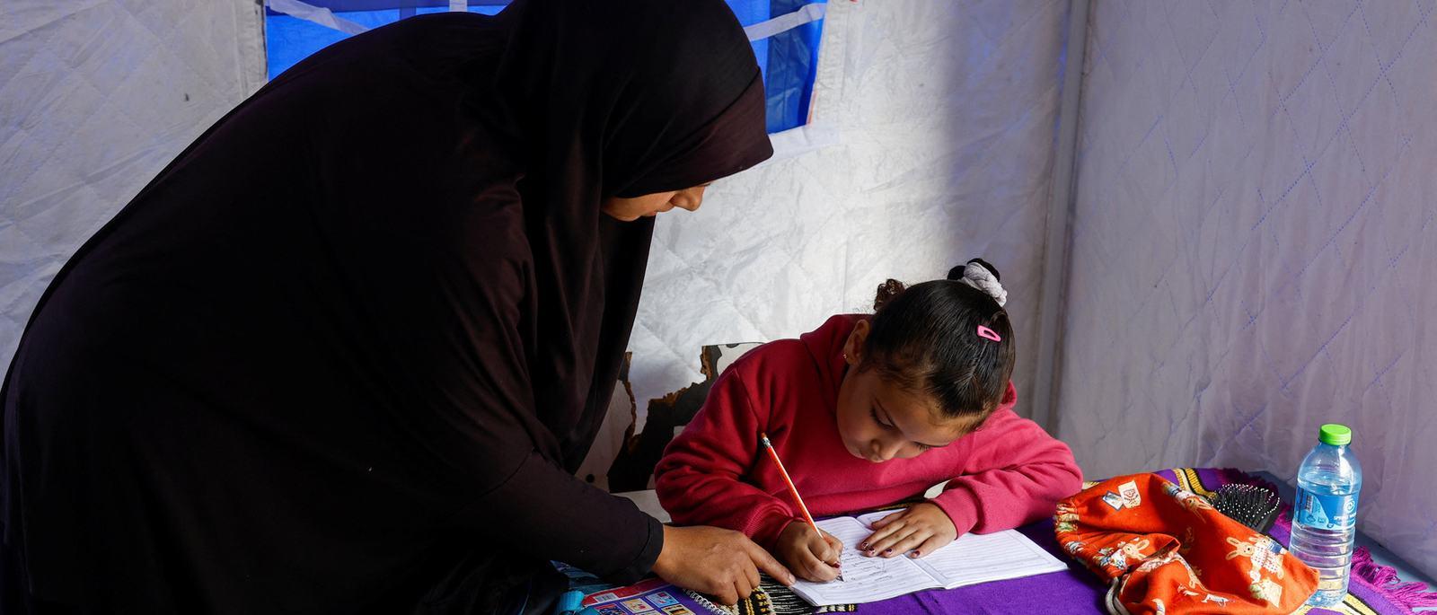 gazas-children-study-in-tents-as-gunfire-rages-by-israels-yellow-line-1768263012.jpg