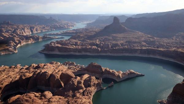 not-only-is-lake-powells-water-level-plummeting-because-of-drought-its-total-capacity-is-shrinking-too-scrape-1767538482.jpg
