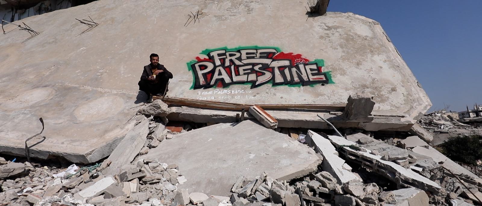the-gaza-graffiti-artist-using-shattered-buildings-as-a-canvas-1768321255.jpg